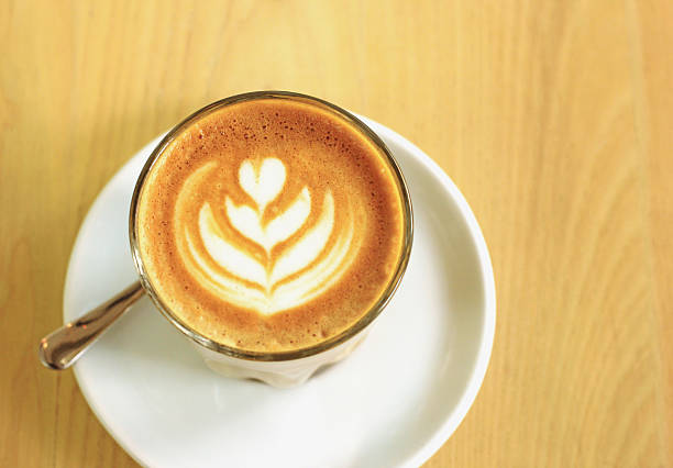 istock Cup of art latte or cappuccino coffee 452197473