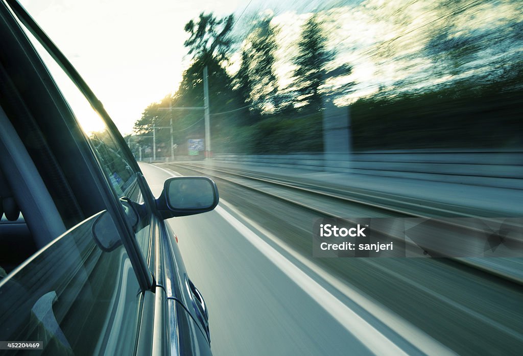 Driving car at the city Motion blur driving Blurred Motion Stock Photo