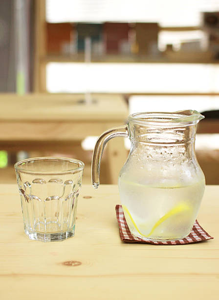 istock Jar of lemonade with empty glass for summer 452217395