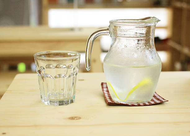 istock Jar of lemonade with empty glass for summer 452219217