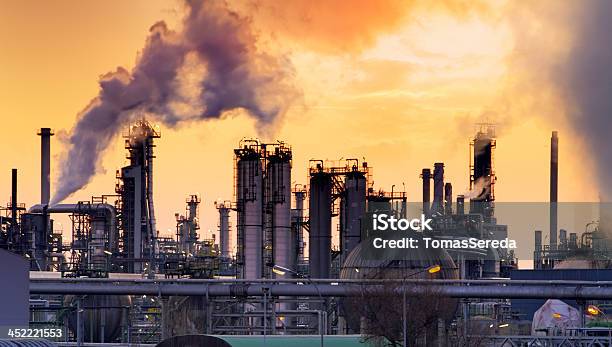 Smokestack In Factory Stock Photo - Download Image Now - Oil Refinery, Atmospheric Mood, Coal