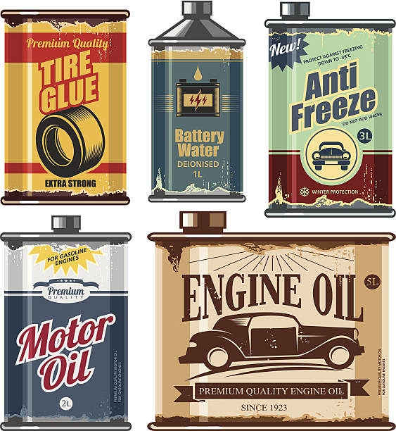 Vintage collection of old motor and engine oil cans, anti freeze, water and tire glue bottles.