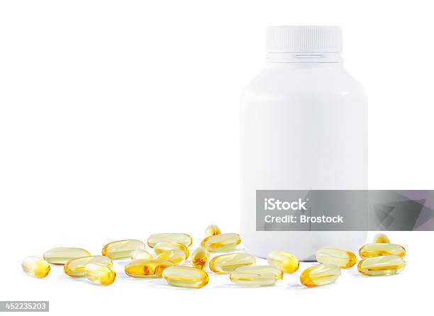 Vitamina - Fotografie stock e altre immagini di Integratore vitaminico - Integratore vitaminico, Sfondo bianco, Vitamina D