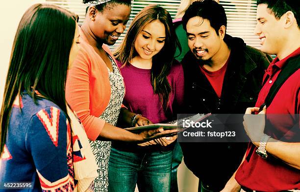 Education Mixedage Students Use Digital Tablet Before Class Stock Photo - Download Image Now