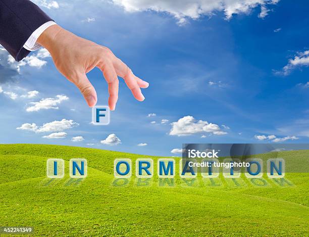 Business Man Hand Made Information Word Buttons Stock Photo - Download Image Now - Blue, Grass, Horizontal