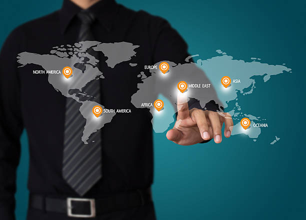 istock hand touch on world map for business travel concept 452241437