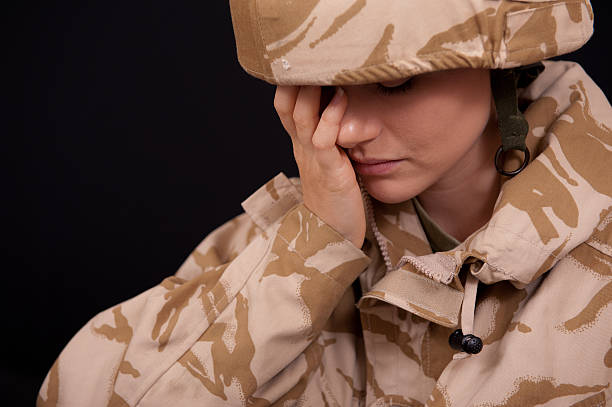 Distraught Female Soldier stock photo