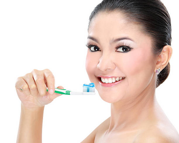 istock Woman with tooth brush 452246319