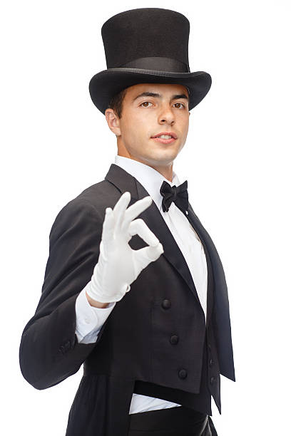 istock magician in top hat showing trick 452246803