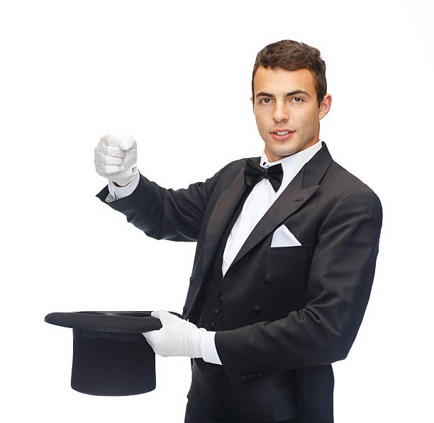 istock magician in top hat showing trick 452248223