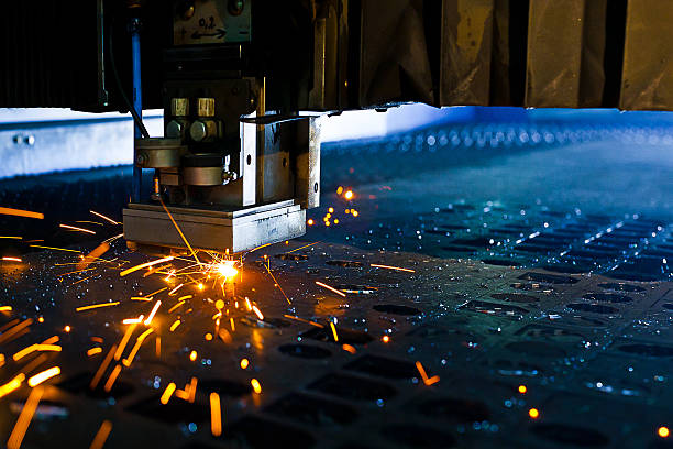 Laser close-up Laser cutting with sparks close up laser cutting metal stock pictures, royalty-free photos & images