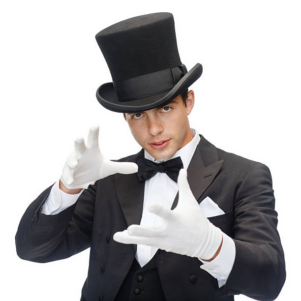 istock magician in top hat showing trick 452253167