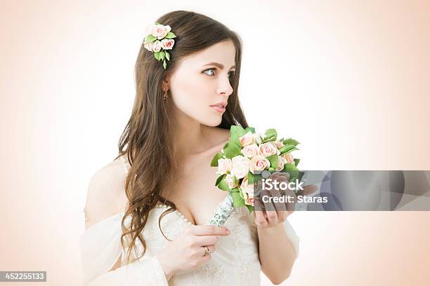 Beautiful Bride With Wedding Bouquet Stock Photo - Download Image Now - 20-24 Years, Adult, Adults Only