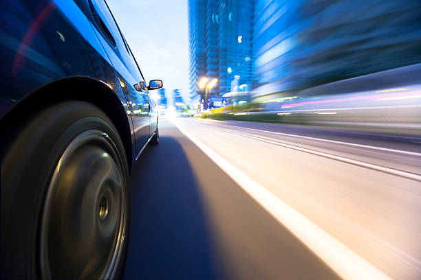 istock Driving in the sunset city. 452263693