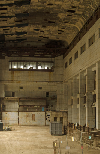 The huge, ruined turbine hall of Battersea Power Station, London.  Now disused and set to be redeveloped into shops and flats.