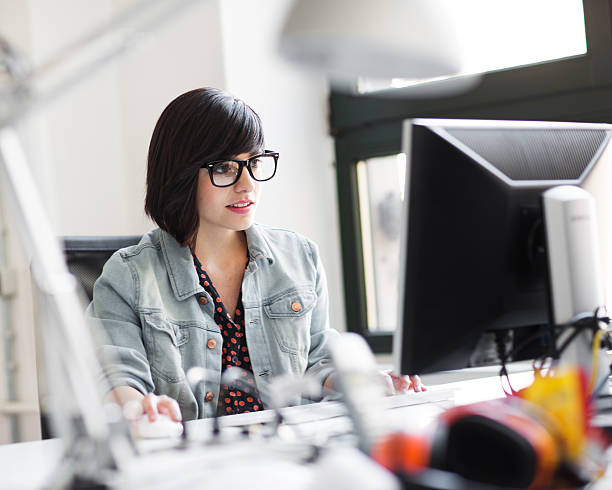 istock Young Business Woman in Modern Office Space 452267427