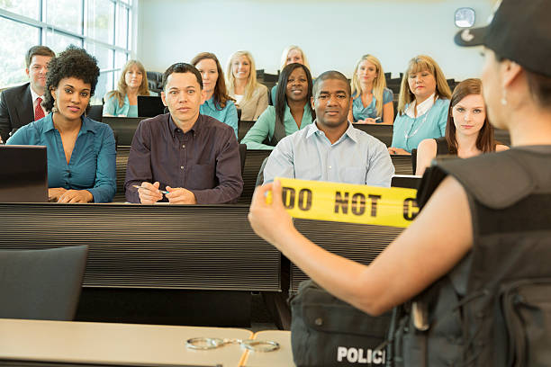 istock Law:  Policewoman speaks to police cadets. 452269749