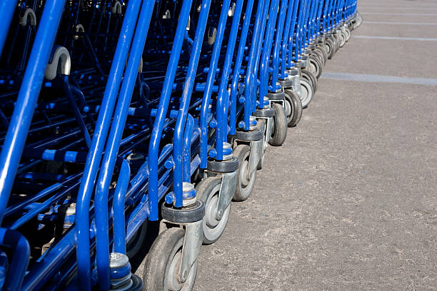 Supermarket trolleys on wheels stock photo
