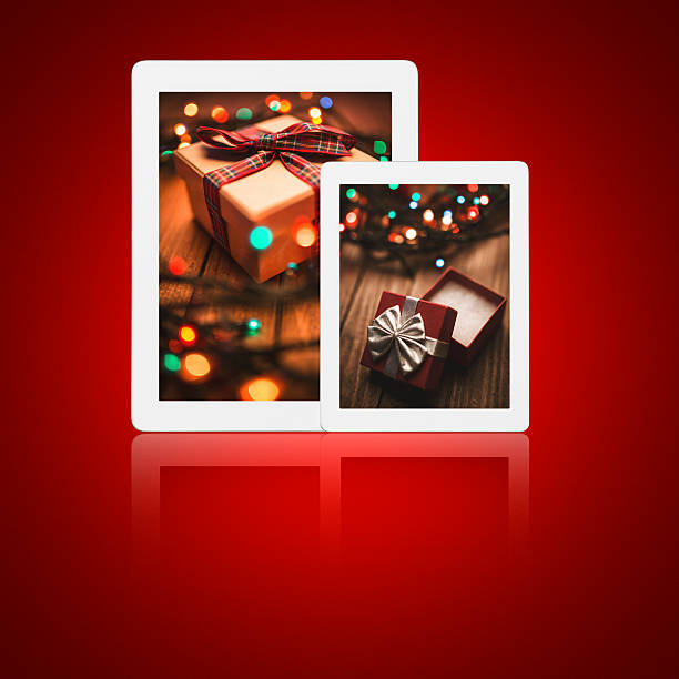 istock Digital tablet with christmas photos on the screen 452350357