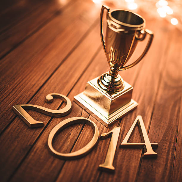istock Gold 2014 New year text with trophy 452352729