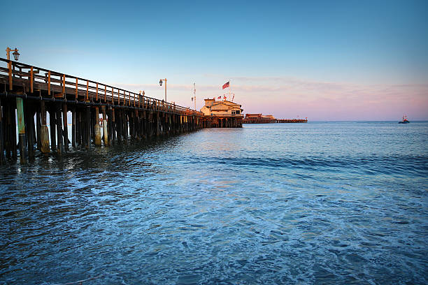 This is a photo of the Santa Barbara pier in California. There is a lot of space for copy or cropping.