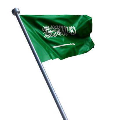 Flag of the Kingdom of Saudi Arabia on modern metal flagpole.