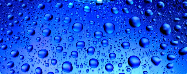 Water drops on hydrophobic surface, close-up shot