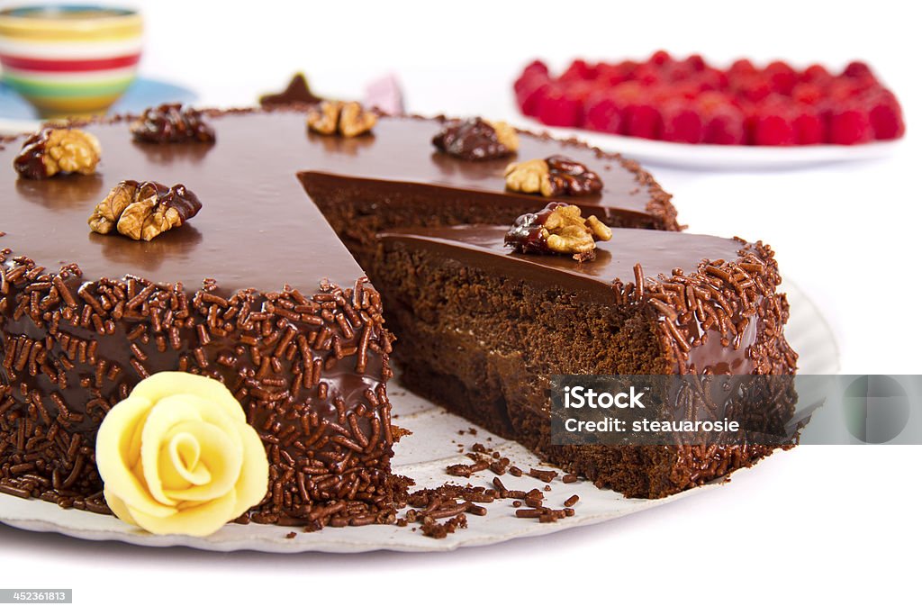 Cake Chocolate cake with nuts and chocolate chips Berry Fruit Stock Photo