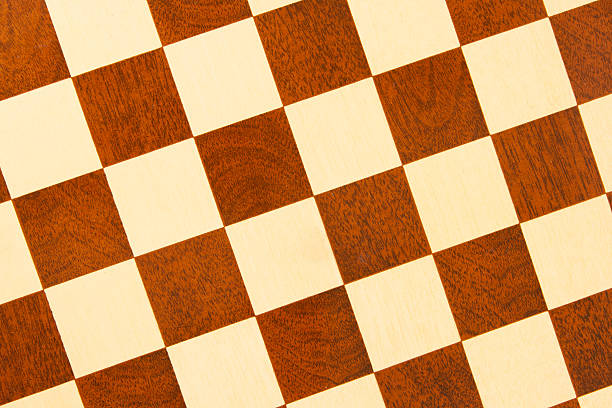 istock Very old wooden chess board, isolated 452365403