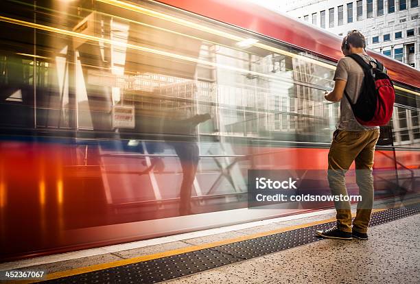 Young Man With Backpack Waiting For Train Stock Photo - Download Image Now - Headphones, Indoors, Subway Train