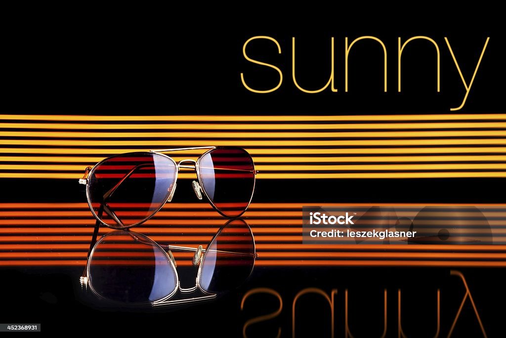 Sunny and sunglasses poster colorful lines black background Sunny and sunglasses poster colorful lines on black background Analog Stock Photo