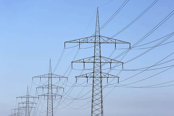 istock Electricity lines and towers 452372711