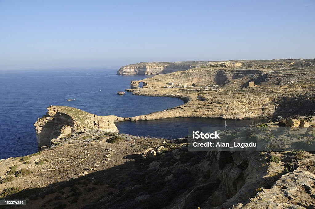Dwejra,Gozo,Maltese Islands. Wide angle image of a coastal landscape. Azure Window - Malta Stock Photo