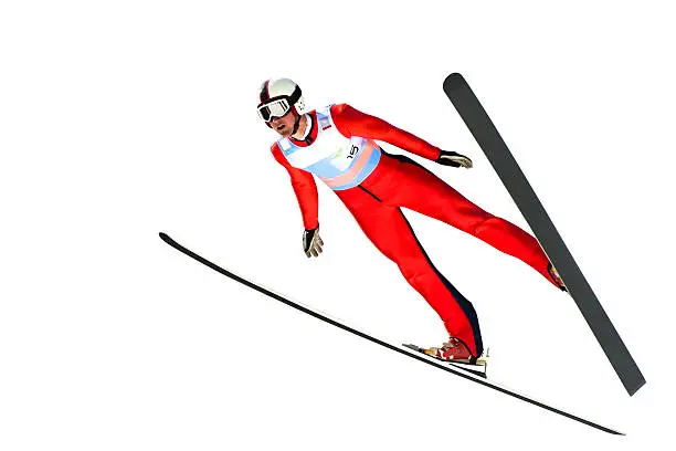 Front view of young male ski jumpare flying, white background