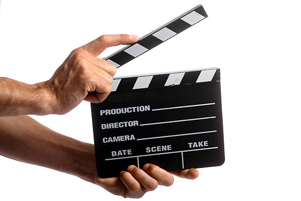 istock Two hands holding a cinema director's cut board 452377733