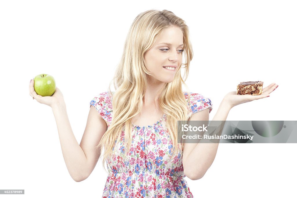 Torta Decision- o un apple? - Foto stock royalty-free di Adulto