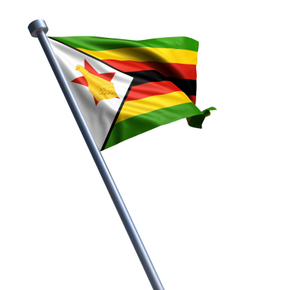 Flag of the Republic of Zimbabwe on modern metal flagpole.