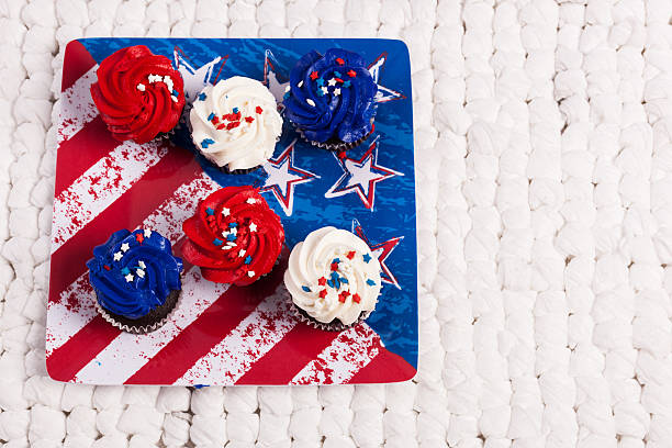 istock Six Patriotic Cupcakes on Plate with aTextured Background 452382135