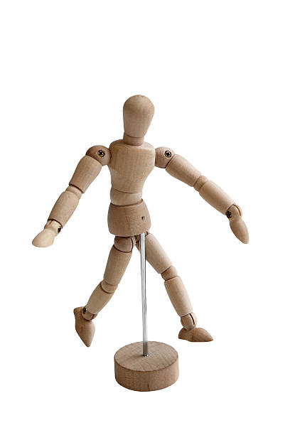 istock Wooden figure walking isolated on white background 452385777