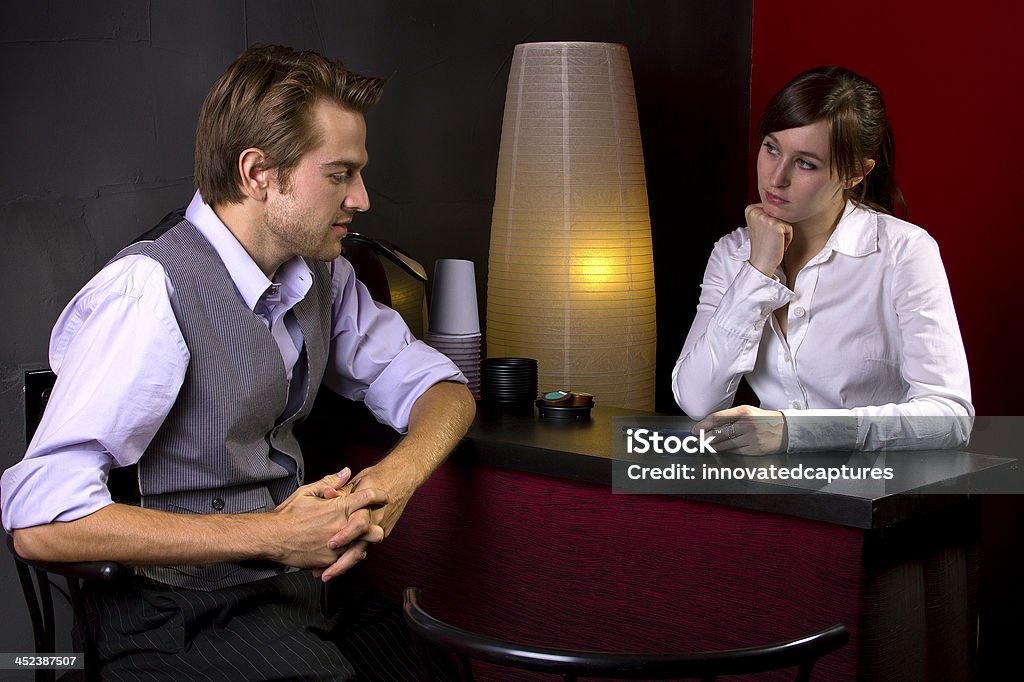Young Businessman Ordering Coffee from Female Waitress young businessman ordering coffee from female waitress Bartender Stock Photo