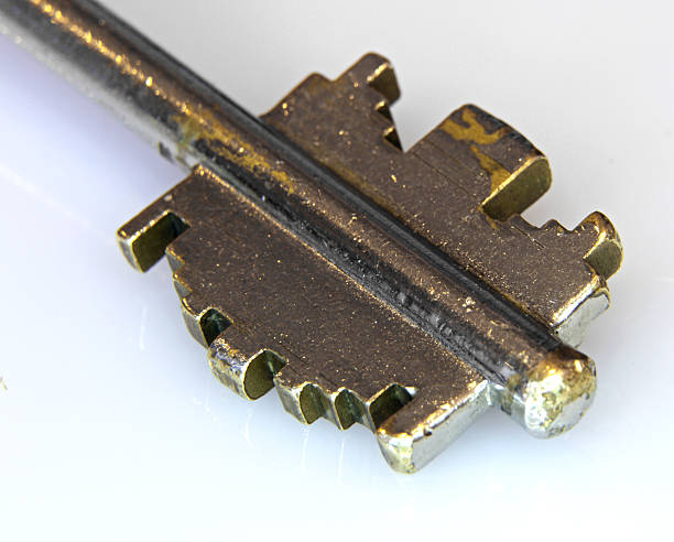 istock stainless steel key to open a lock security door 452397257