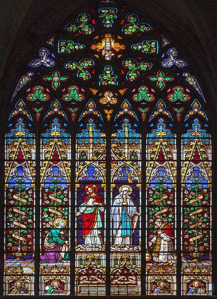 istock Mechelen - Jesus ans his mother on windowpane in cathedral 452460017