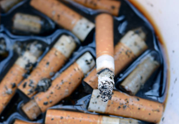 istock Ashtray Full of Cigarettes burnt butts 452466069
