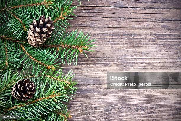 Christmas Fir Tree On A Wooden Background Stock Photo - Download Image Now - Antique, Backgrounds, Border - Frame