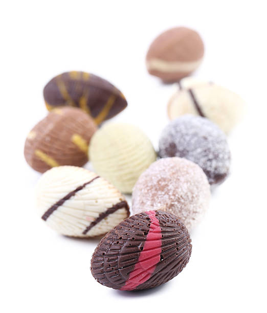 istock Bunch of colorful chocolate seashell. 452475035