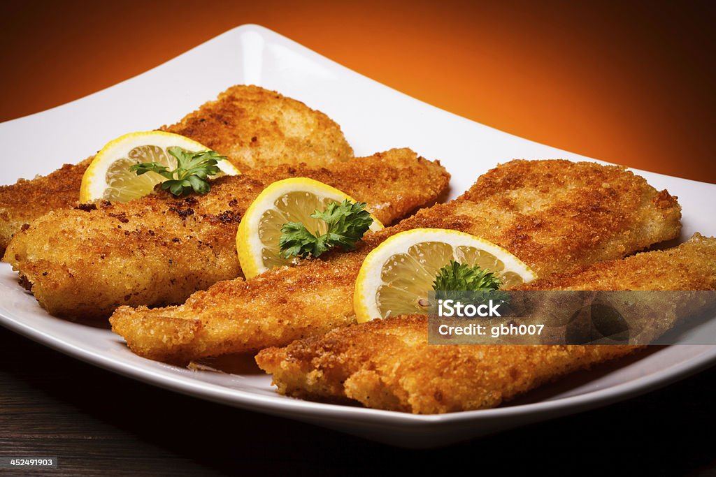 Fried cod fillets and vegetables Fish dish Fried Stock Photo