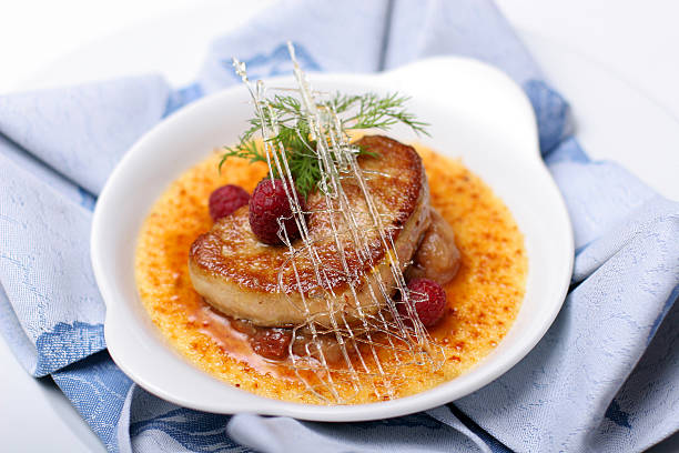 istock Foie gras with raspberries syrup. 452493465