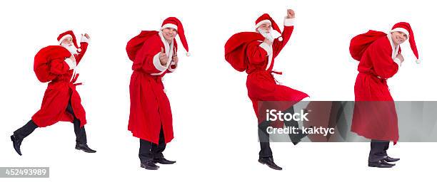 Santa Claus On The Run To Delivery Christmas Gifts Stock Photo - Download Image Now - Active Seniors, Adult, Bag
