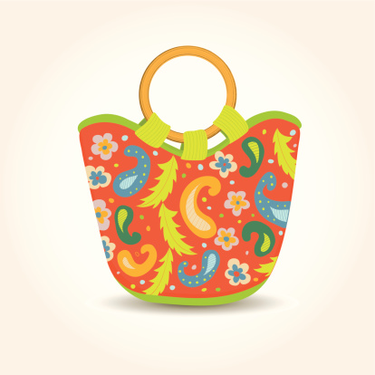 Vector illustration of the summer woman beach bag with bright print and wooden handles