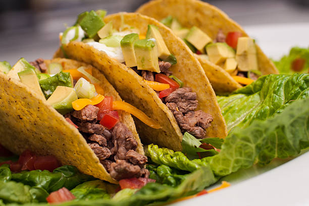 istock Trio of roast beef hard-shell tacos 452506591